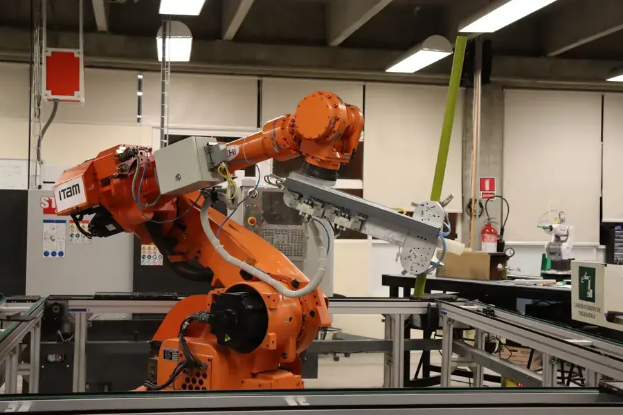 Engineering approach represented by a machine development cell with robotic automation equipment